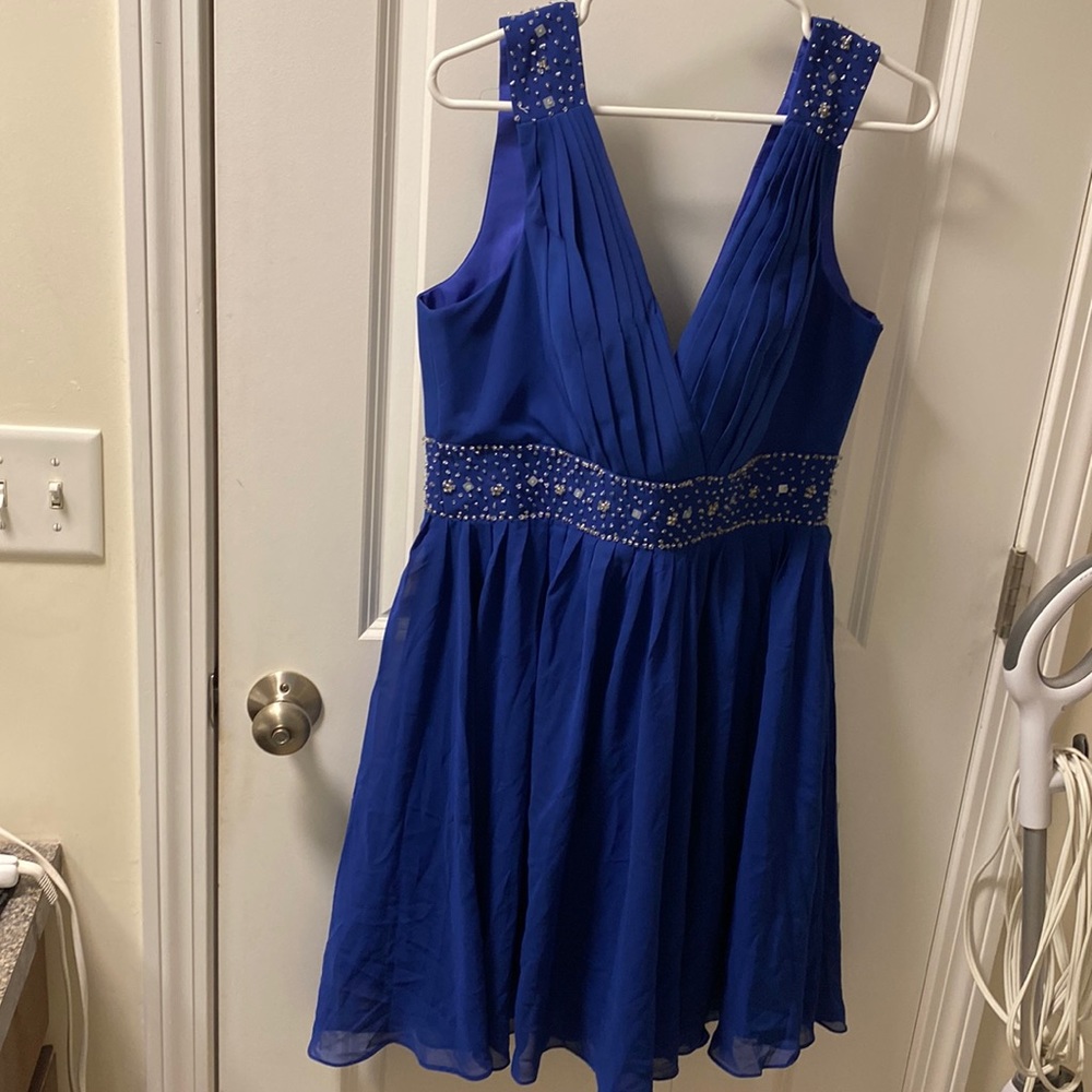 Brand new Grace Karin short blue chiffon dress, size 12. Beaded detail.